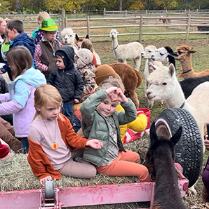 familiy_fun_kids_on_tractor Handsfull Farm, a family-friendly destination for glamping, farm tours, celebrations and retreats.